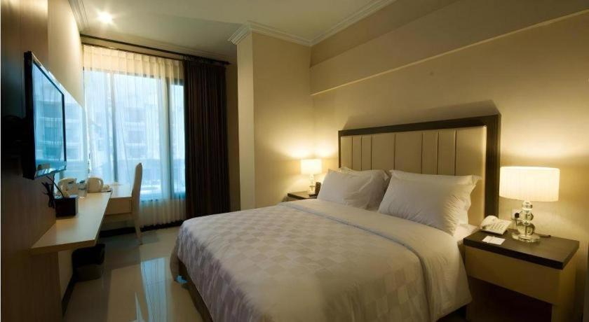 Bella Hotel Surabaya Esterno foto